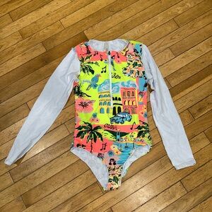 Women’s Maaji long sleeve onesie footie piece swim Habana Triton rash guard zip